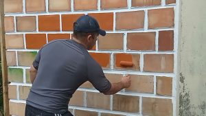 Cómo pintar un muro de ladrillo exterior